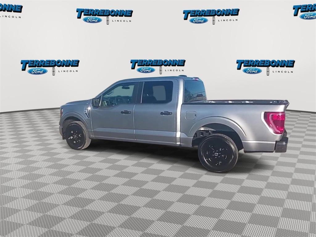 used 2023 Ford F-150 car, priced at $34,022