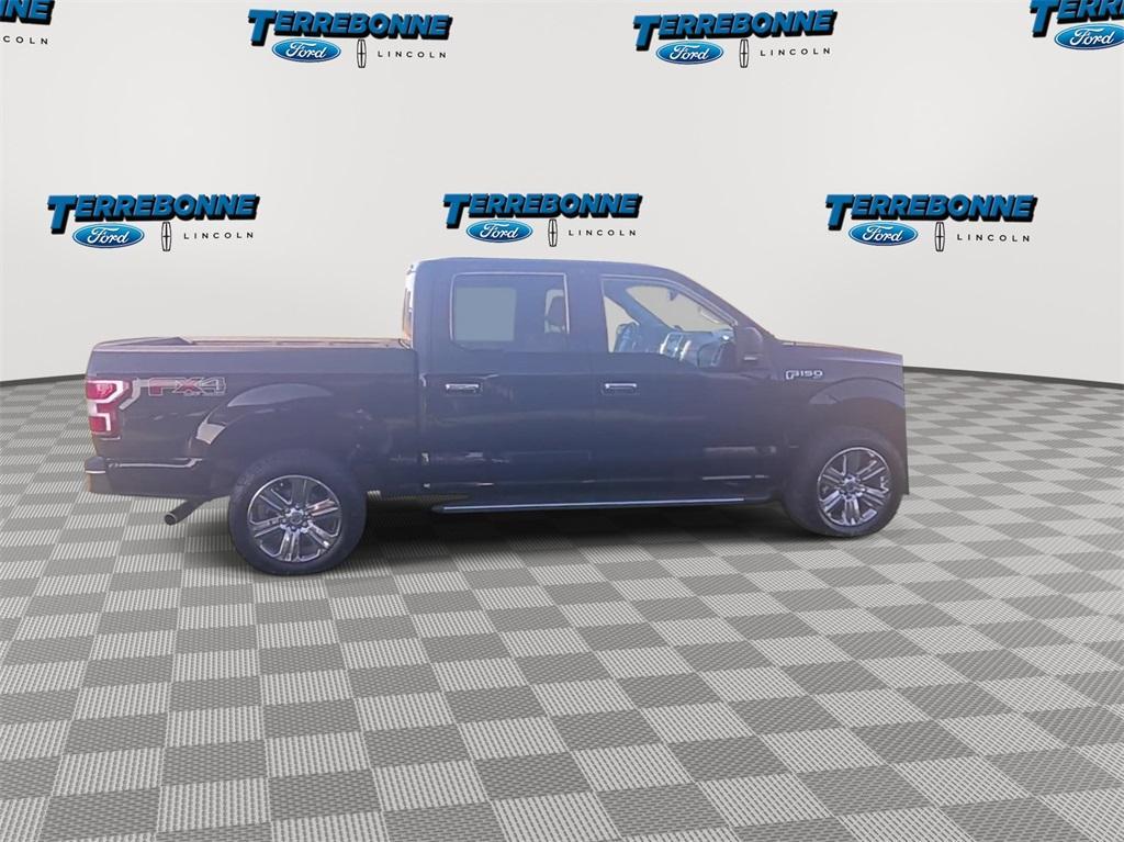 used 2018 Ford F-150 car, priced at $26,628