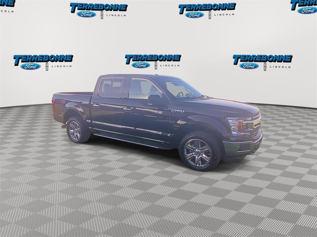 used 2018 Ford F-150 car, priced at $26,628