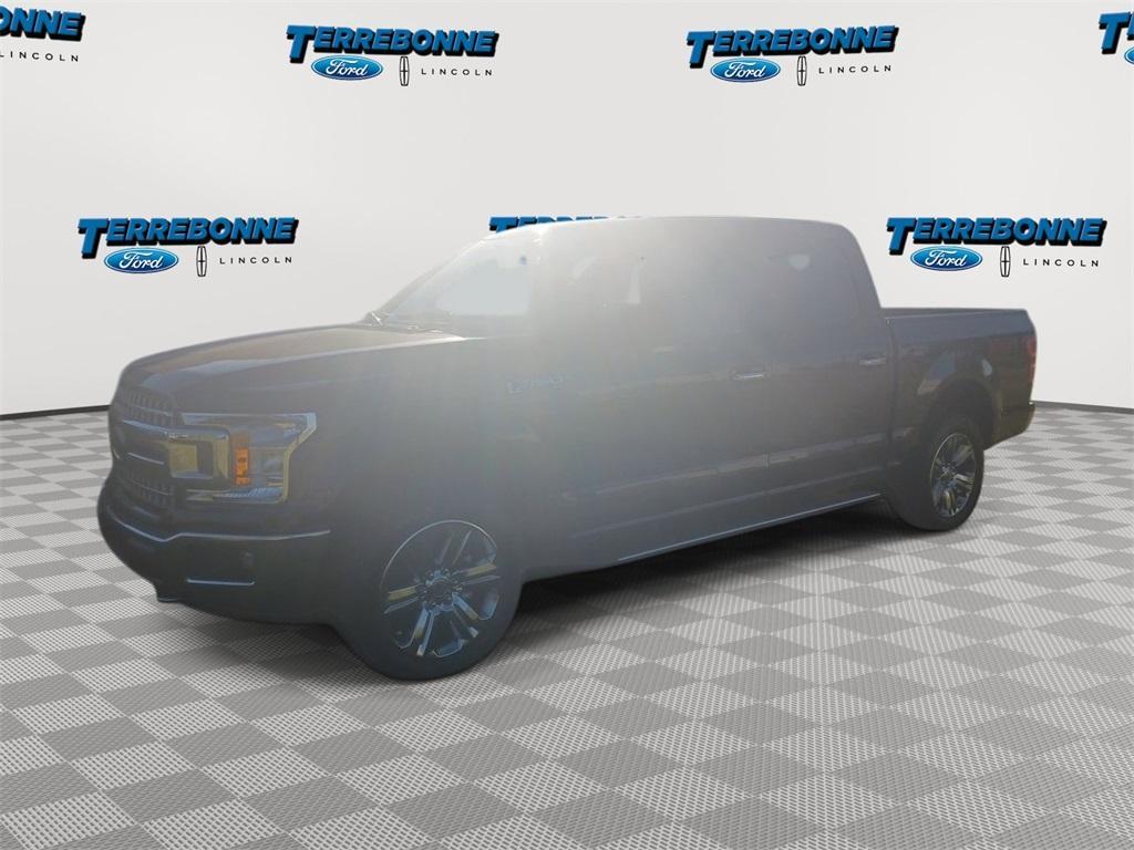 used 2018 Ford F-150 car, priced at $26,628