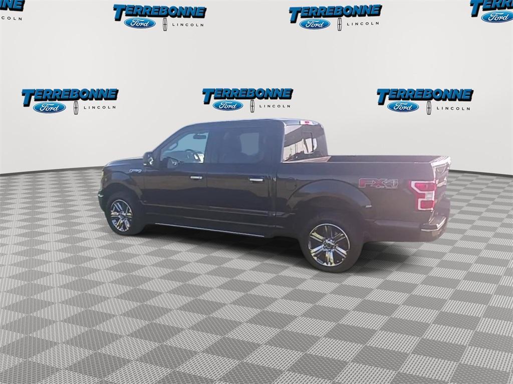 used 2018 Ford F-150 car, priced at $26,628