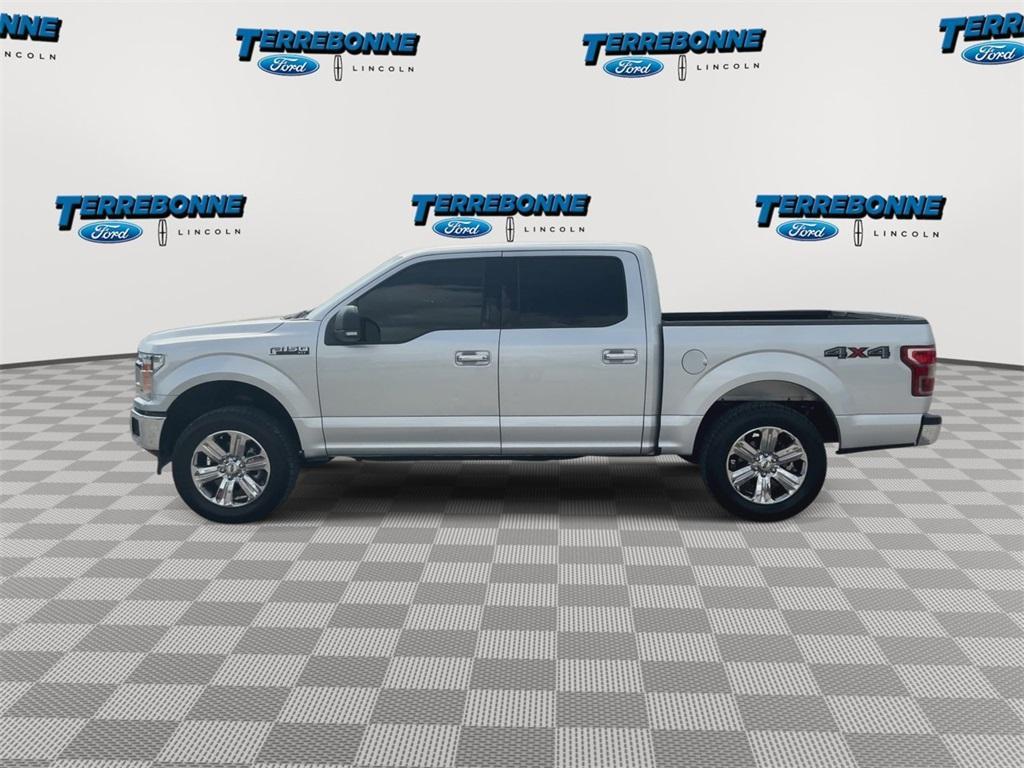 used 2019 Ford F-150 car, priced at $30,828