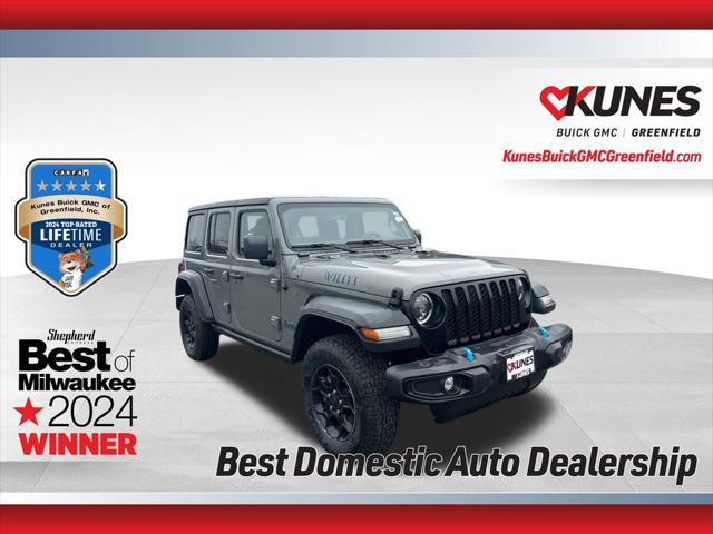 used 2023 Jeep Wrangler 4xe car, priced at $27,385