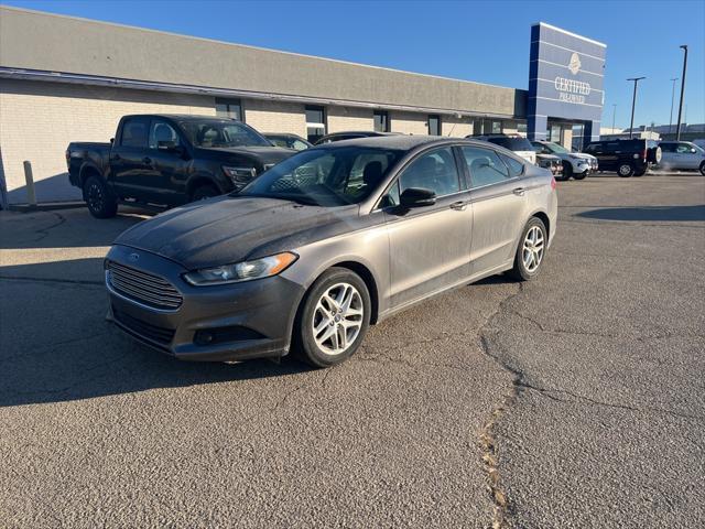 used 2013 Ford Fusion car, priced at $5,998