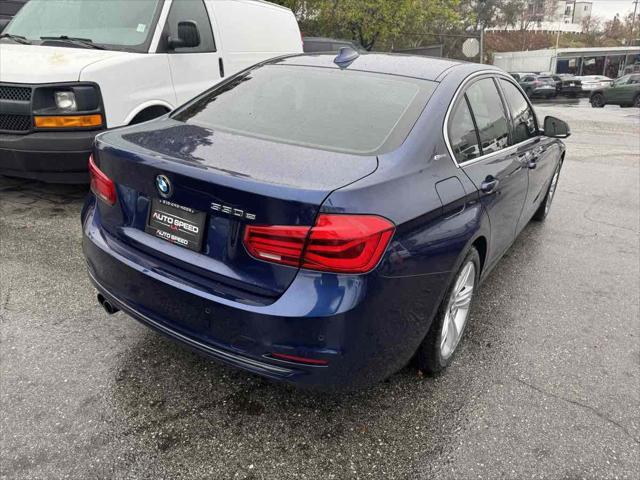 used 2018 BMW 330e car, priced at $12,795