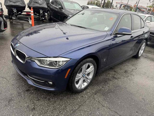 used 2018 BMW 330e car, priced at $12,795