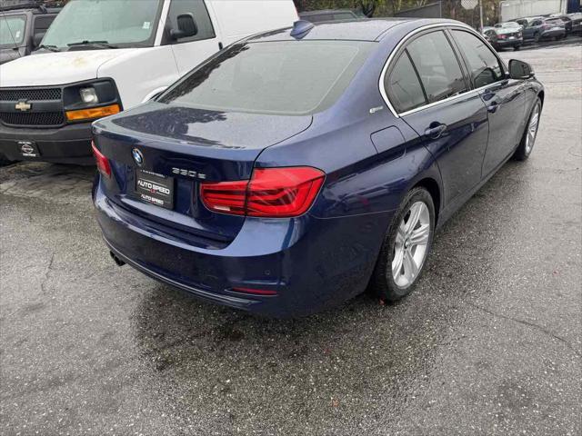 used 2018 BMW 330e car, priced at $12,795