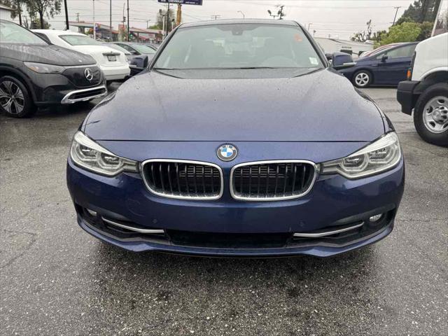 used 2018 BMW 330e car, priced at $12,795