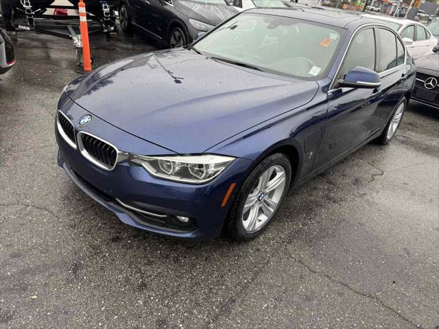 used 2018 BMW 330e car, priced at $12,795