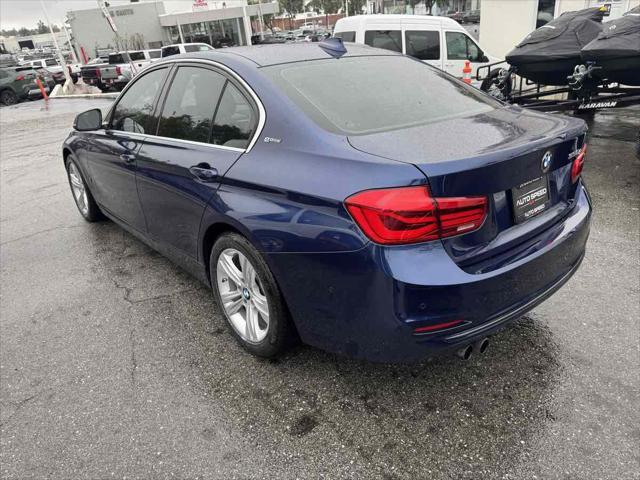 used 2018 BMW 330e car, priced at $12,795