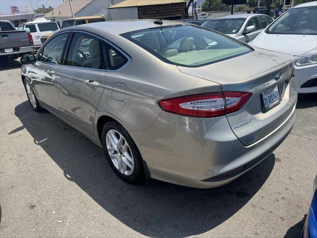 used 2016 Ford Fusion car, priced at $11,995