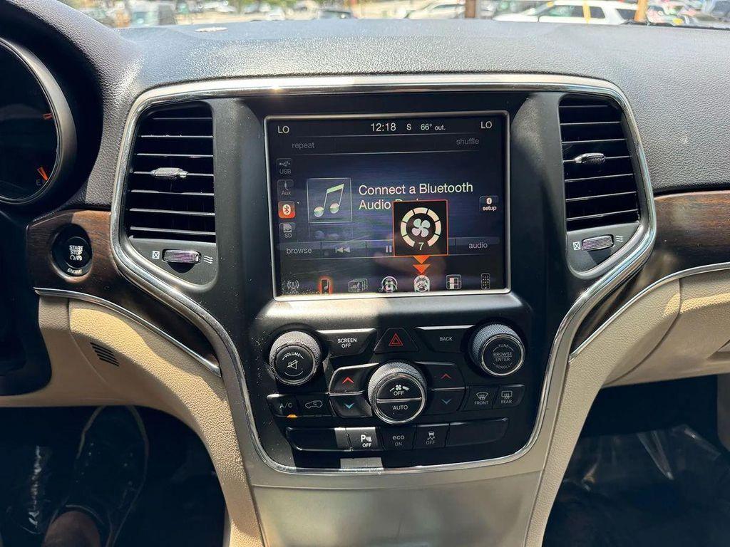 used 2014 Jeep Grand Cherokee car, priced at $10,995