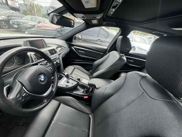 used 2018 BMW 330e car, priced at $15,900