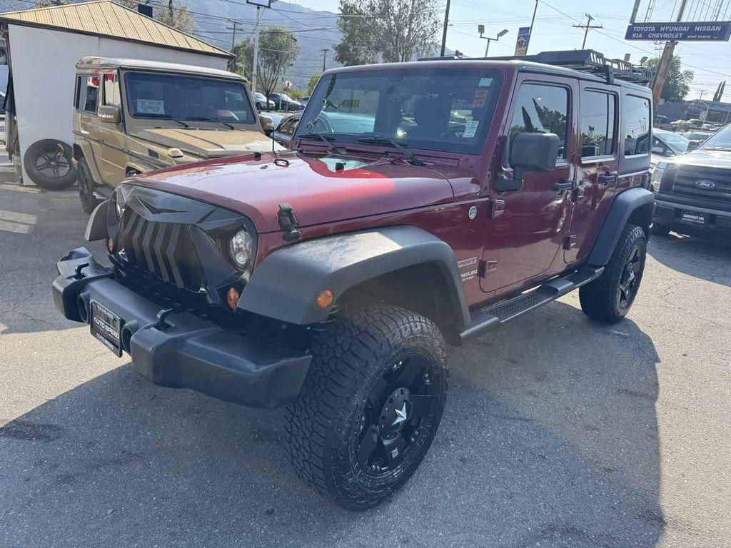 used 2013 Jeep Wrangler Unlimited car, priced at $13,995