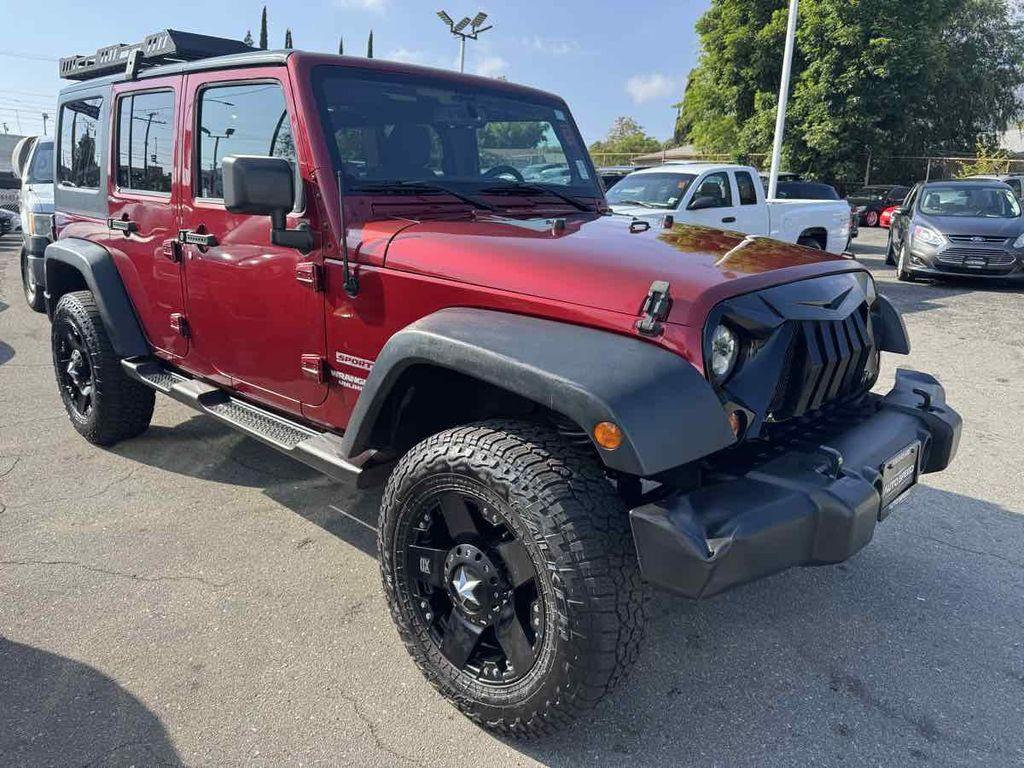 used 2013 Jeep Wrangler Unlimited car, priced at $13,995