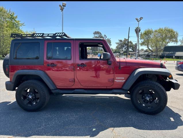 used 2013 Jeep Wrangler Unlimited car, priced at $16,700