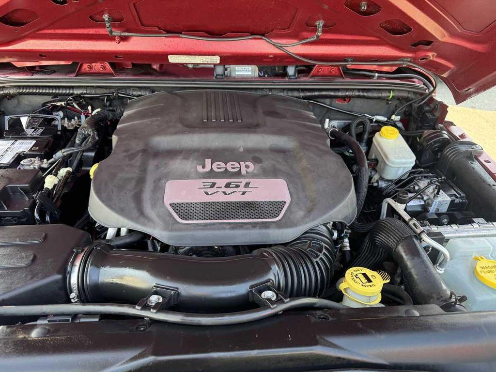 used 2013 Jeep Wrangler Unlimited car, priced at $13,995