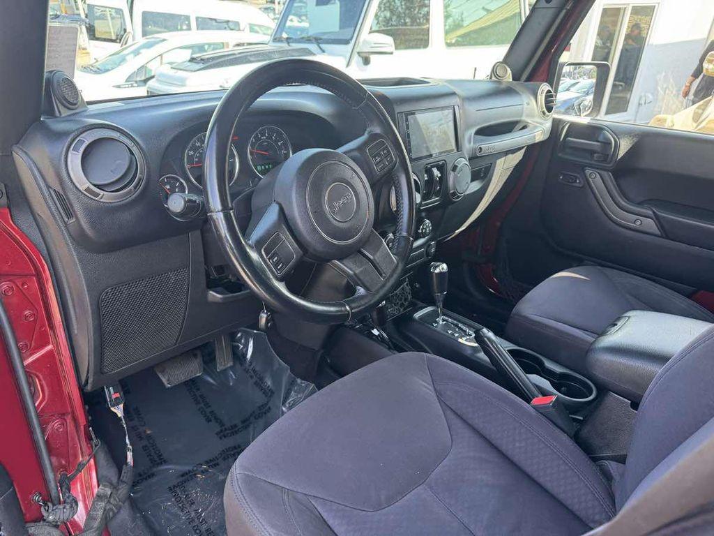 used 2013 Jeep Wrangler Unlimited car, priced at $13,995