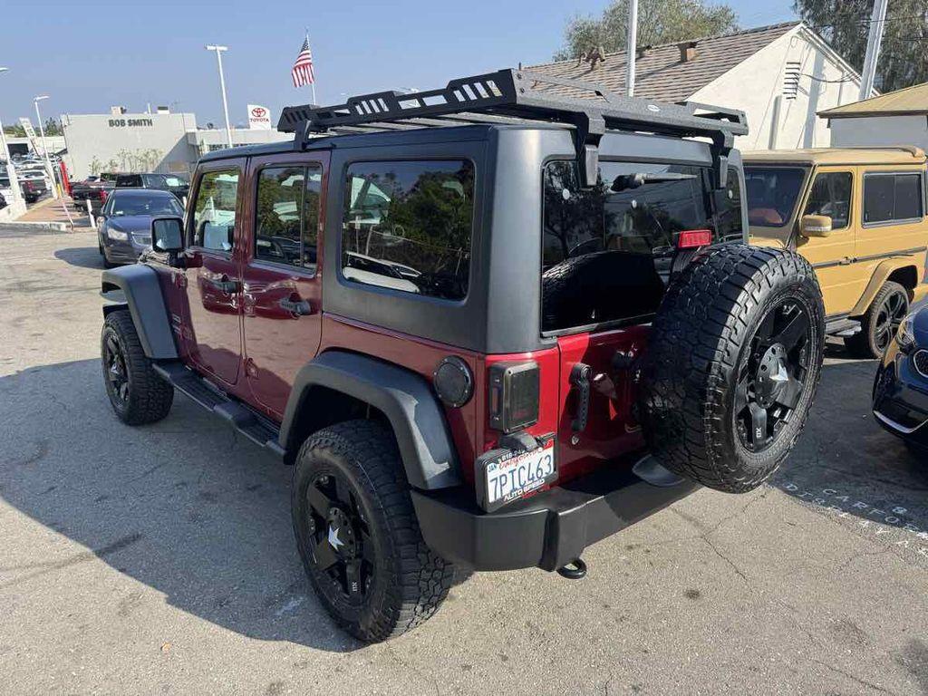 used 2013 Jeep Wrangler Unlimited car, priced at $13,995