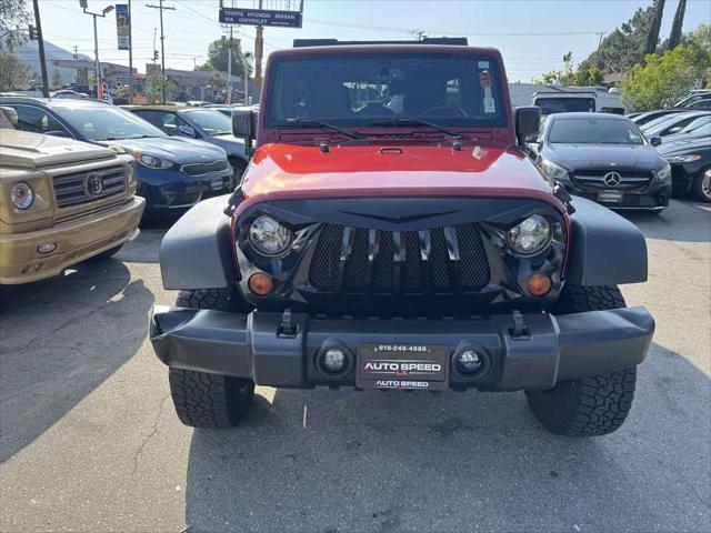 used 2013 Jeep Wrangler Unlimited car, priced at $16,700