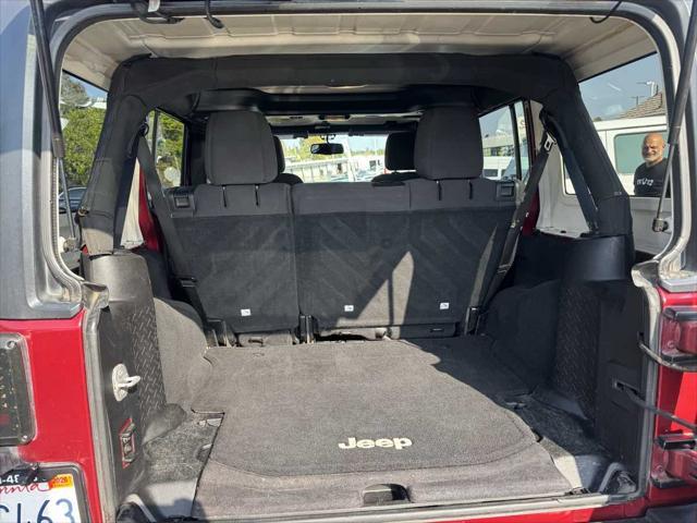 used 2013 Jeep Wrangler Unlimited car, priced at $16,700