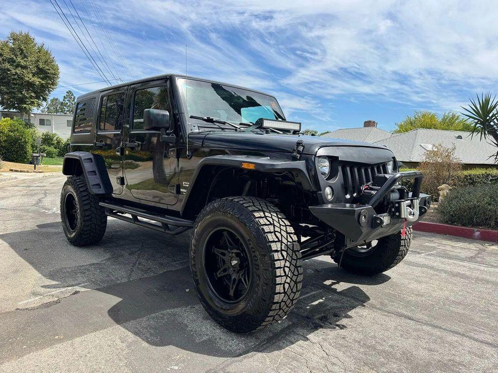 used 2015 Jeep Wrangler Unlimited car, priced at $18,995
