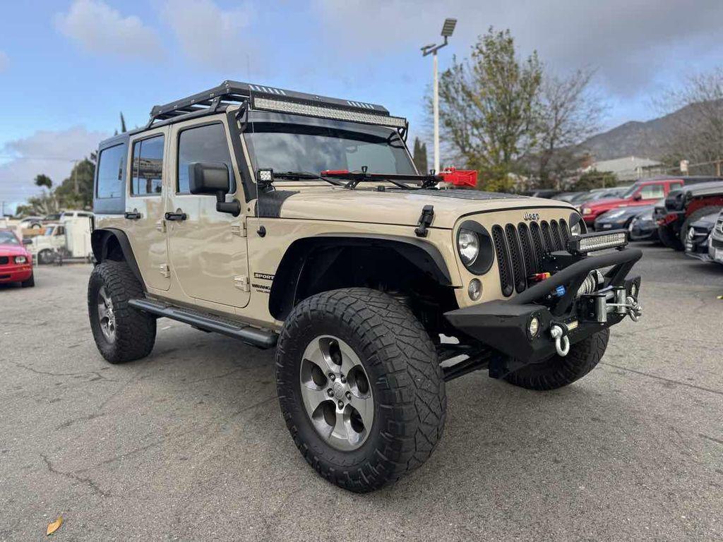 used 2016 Jeep Wrangler Unlimited car, priced at $18,900