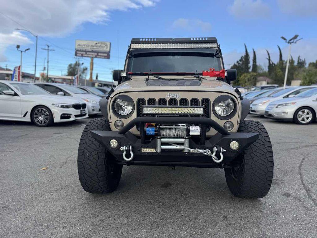 used 2016 Jeep Wrangler Unlimited car, priced at $18,900