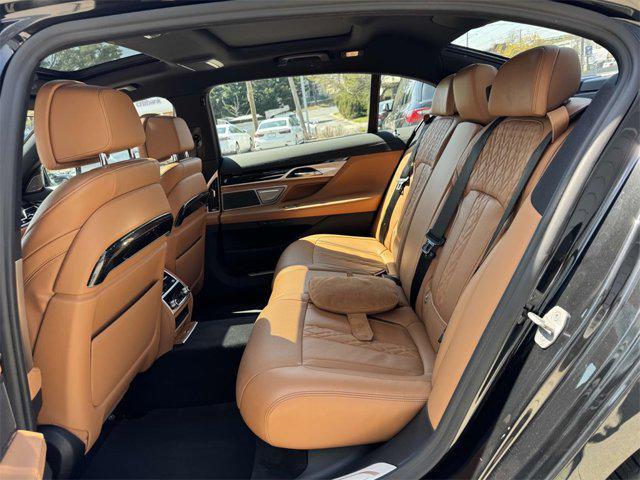 used 2022 BMW 750 car, priced at $63,888
