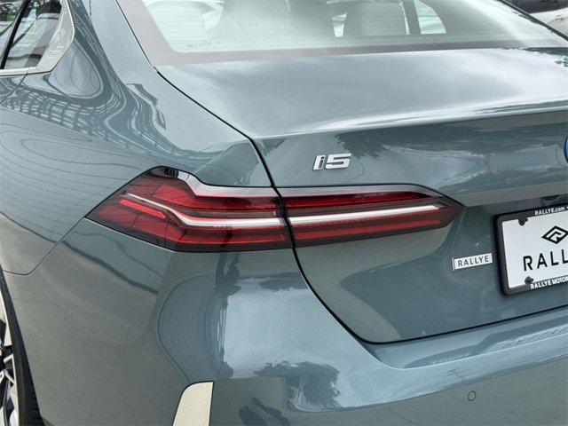 used 2024 BMW i5 car, priced at $61,998