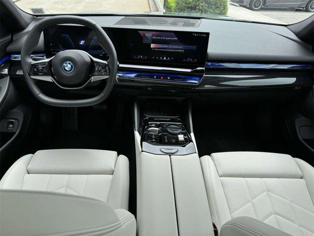 used 2024 BMW i5 car, priced at $61,998