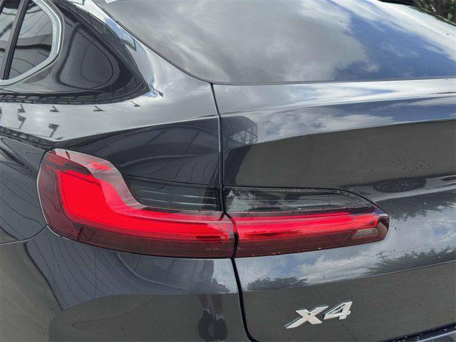 used 2022 BMW X4 car, priced at $39,888