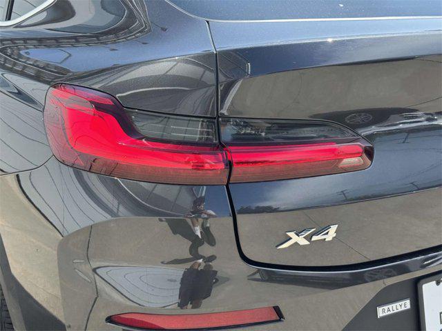 used 2022 BMW X4 car, priced at $41,888