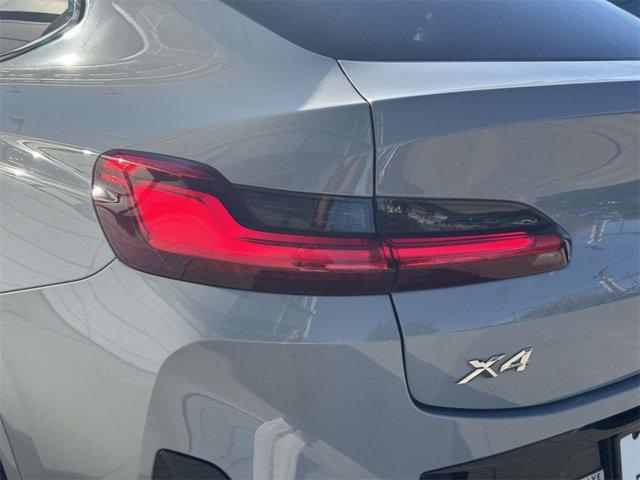 used 2023 BMW X4 car, priced at $45,888