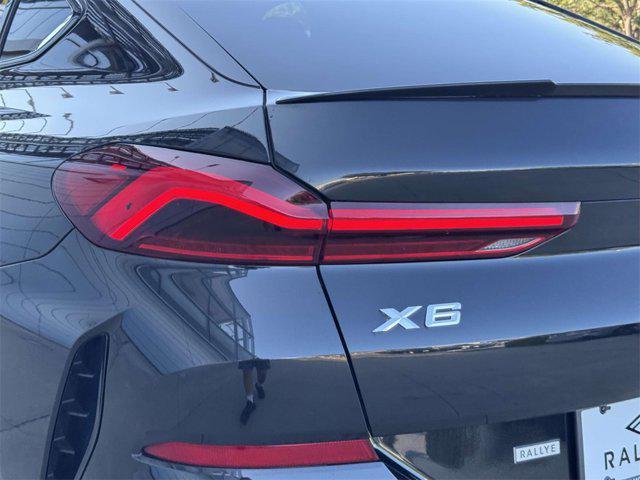 used 2023 BMW X6 car, priced at $59,998