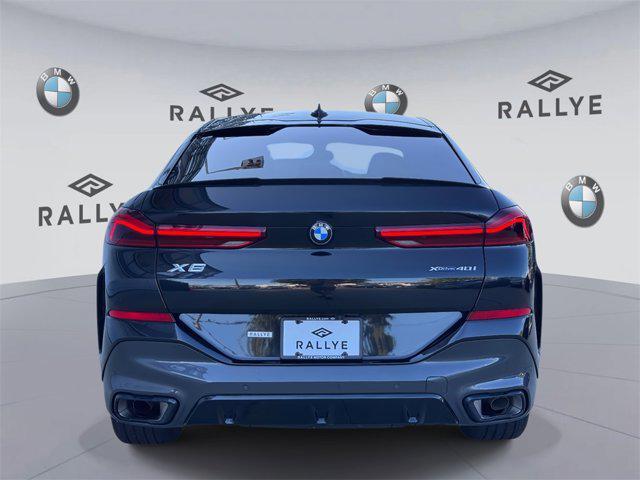 used 2023 BMW X6 car, priced at $59,998