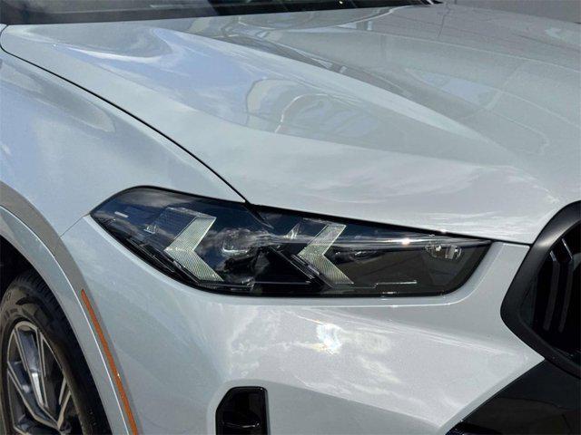 used 2025 BMW X6 car, priced at $93,888