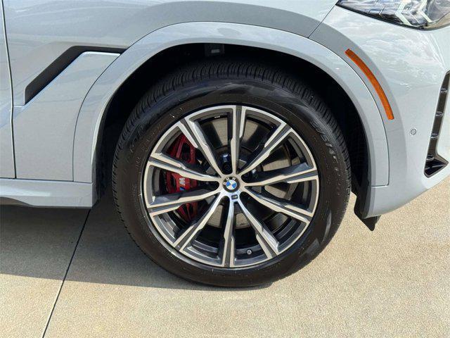 used 2025 BMW X6 car, priced at $93,888