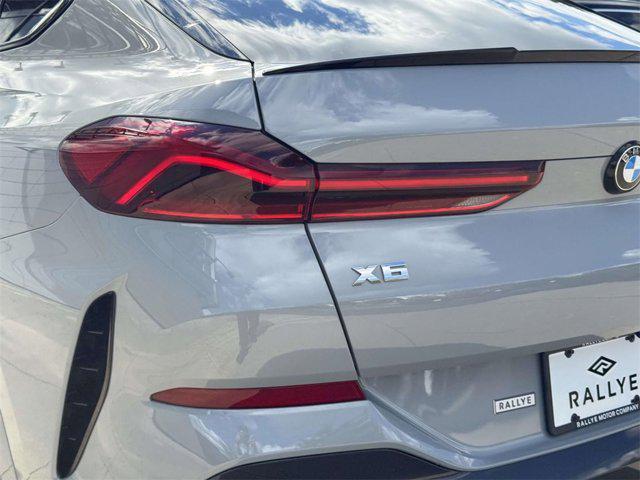 used 2025 BMW X6 car, priced at $93,888