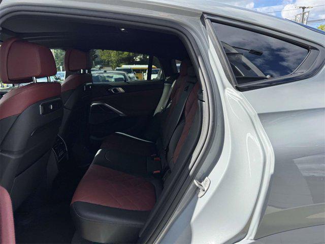 used 2025 BMW X6 car, priced at $93,888