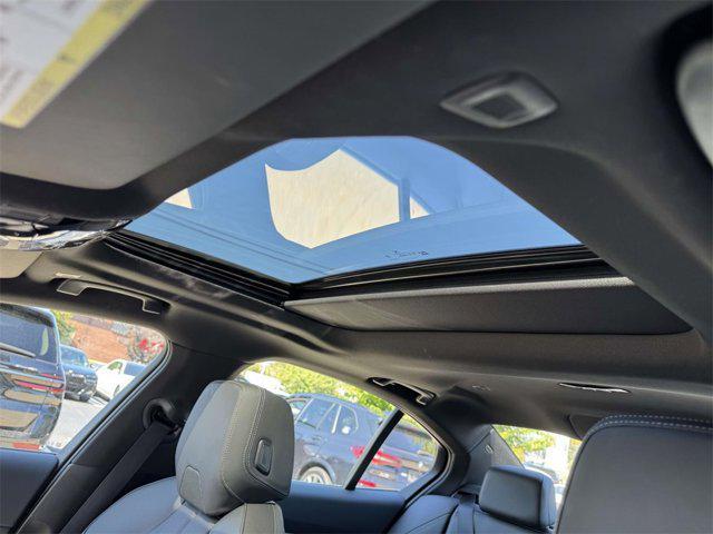 used 2024 BMW i5 car, priced at $66,888