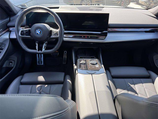 used 2024 BMW i5 car, priced at $66,888