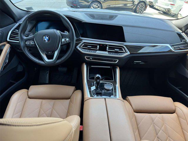used 2023 BMW X6 car, priced at $54,998