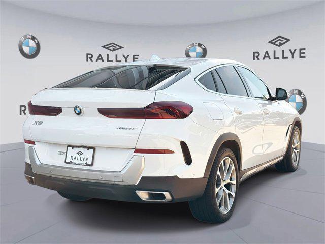 used 2023 BMW X6 car, priced at $54,998