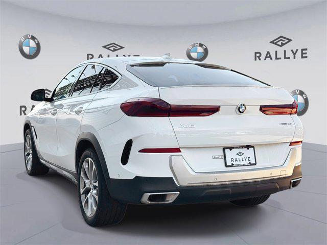used 2023 BMW X6 car, priced at $54,998
