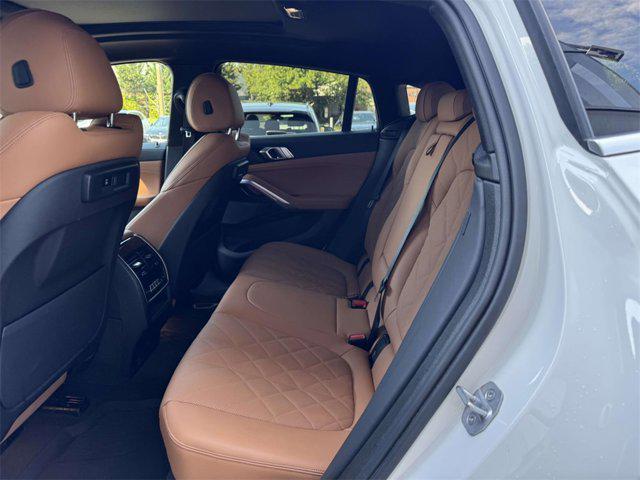 used 2023 BMW X6 car, priced at $54,998