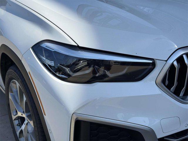 used 2023 BMW X6 car, priced at $54,998