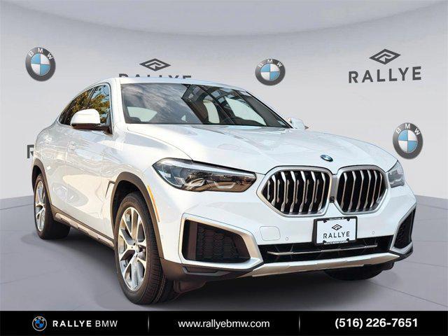 used 2023 BMW X6 car, priced at $54,998