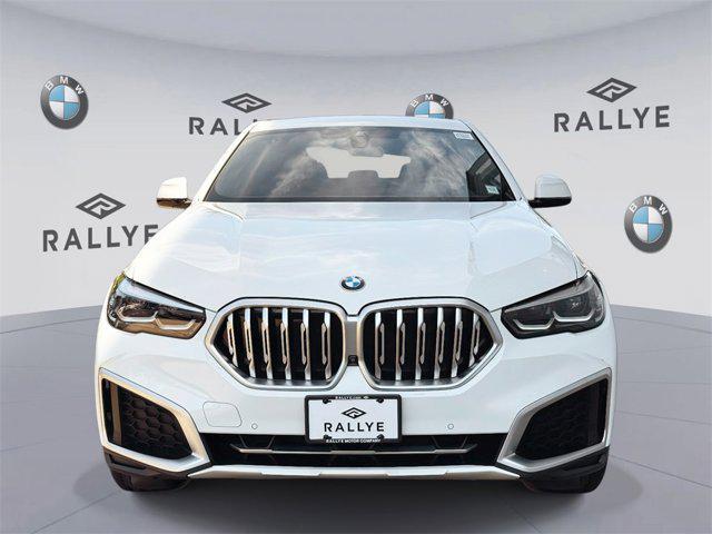 used 2023 BMW X6 car, priced at $54,998