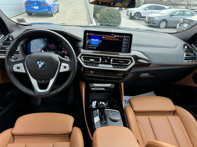 used 2022 BMW X4 car, priced at $39,998